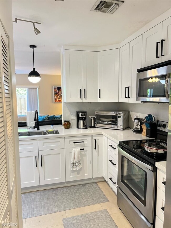 Building Photo - 3 br, 2.5 bath House - 10851 NW 8th St