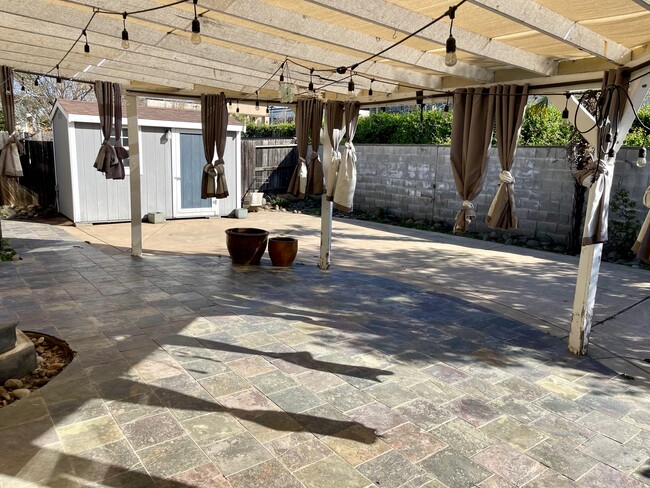 Backyard patio with finished shed - 2234 Misty Hollow Dr