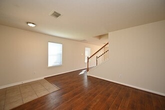 Building Photo - 9403 Coatsworth Dr