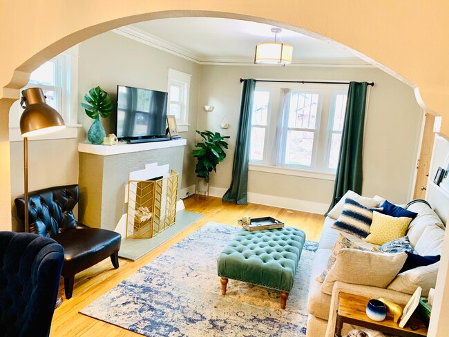 Gorgeous arch entryways, moldings, and other craftsmen details. - 1447 Osceola St