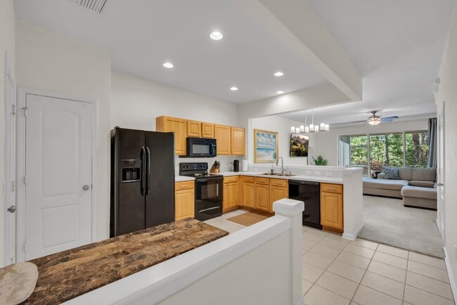 Building Photo - Furnished Townhome with Conservation View in The Bay at Cypress Creek!