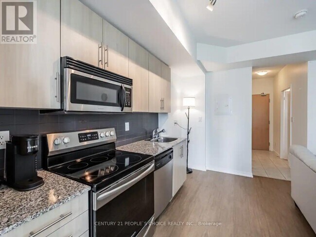 Photo du bâtiment - 65-1265 Bremner Blvd