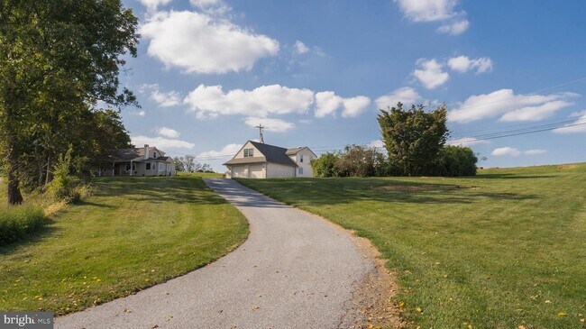 Main driveway shared with neighboring home, 1040 N. Milford - 1050 N Milford Rd