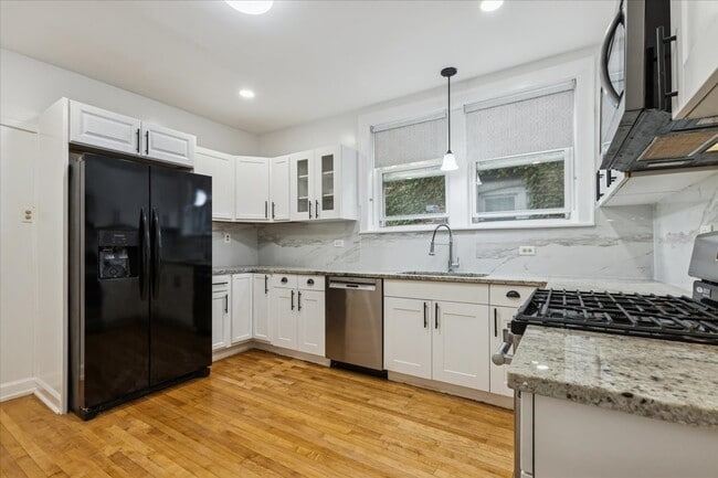 Building Photo - 6724 N Campbell Ave