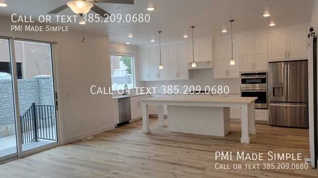 Building Photo - Reduced Price! Elevator, Finished Basement...