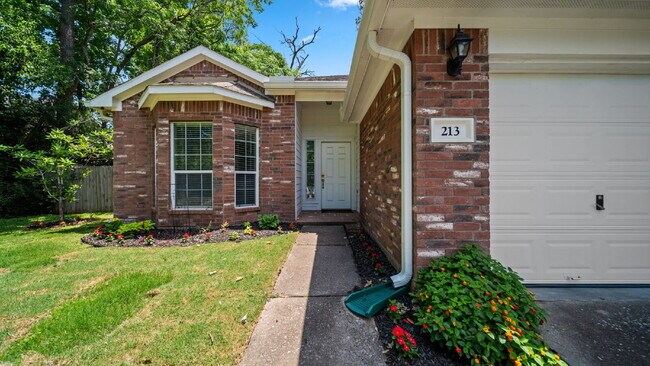 Building Photo - Move-In Ready Montgomery Home with Fenced Yard & Mature Trees!