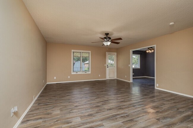 Building Photo - 3 Bedroom, 2 Bath With A 2 Car Garage & PE...