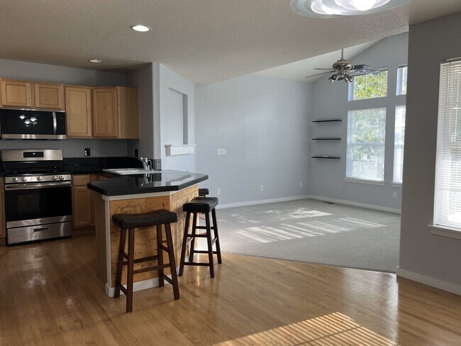 Open Floor Plan: Kitchen + Living Area - 14239 Pikeminnow Pl