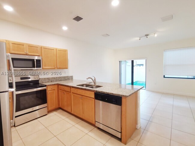 Foto del edificio - 9398 W 32nd Ln