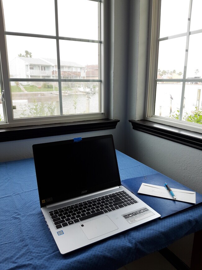 This is where I work, also a desk in bedroom 2 - 15421 Seamount Cay Ct
