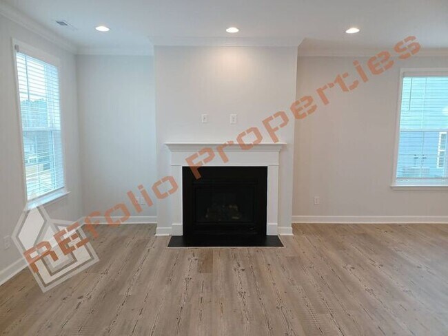 Building Photo - Brand New 4 BD Home w/Balconies in The Pre...