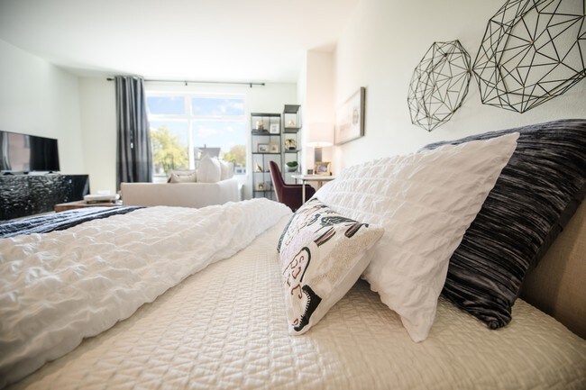 The George Besaw Apartments Cama y almohadas - The George Besaw