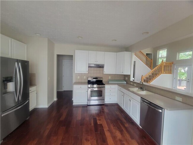 Foto del edificio - 6444 Hilltop Trail Dr
