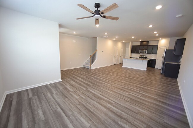 Building Photo - Beautiful 3 Bed+Bonus+2 Car Garage Townhome in New Wake Forest Community