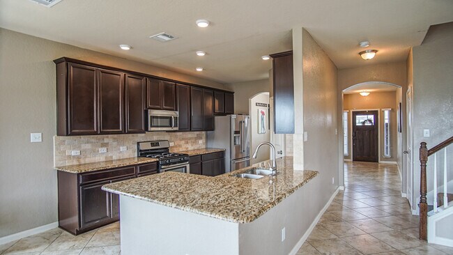open kitchen that opens to family room - 272 Lillianite