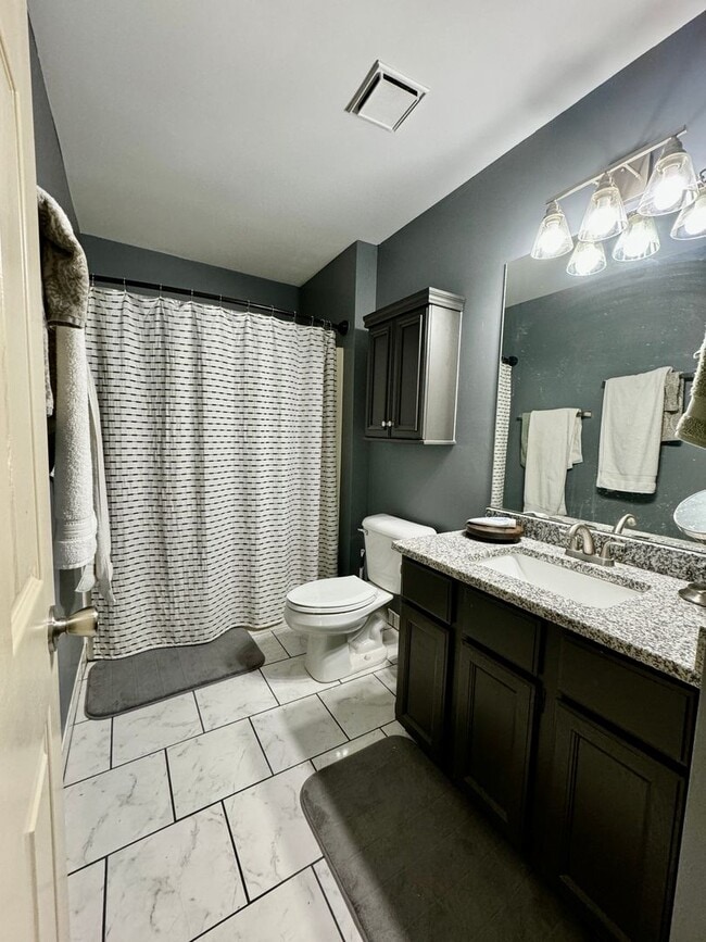 Photo - 4 Bedrooms with Finished Basement and Bonus Room! House