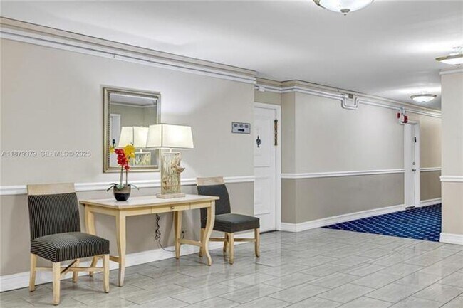 Building Photo - 5005 Collins Ave