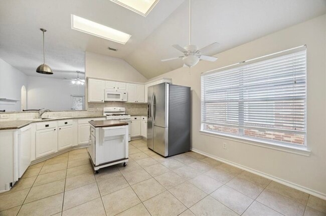 Foto del edificio - 6715 Rockwall Trail Dr