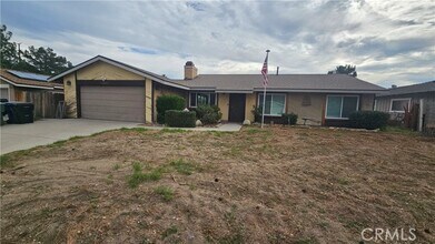 Building Photo - 5683 Wagonwheel Rd