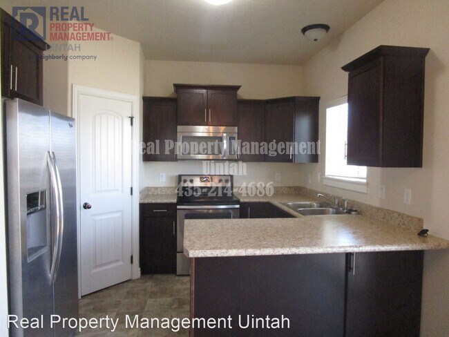 Foto del edificio - 3 br, 2.5 bath House - 407 E Gray Fox Lane