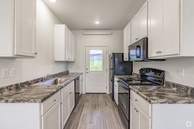 Kitchen - Jayhawks Patio Home Apartments