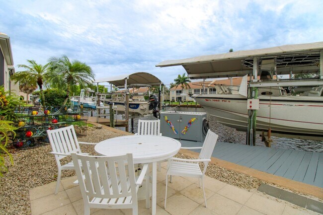 Building Photo - ** WATERFRONT HOME WITH DOCK ** SEE DOLPHINS & MANATEES FROM YOUR PRIVATE DOCK ** 2-BED/2-BATH SI...