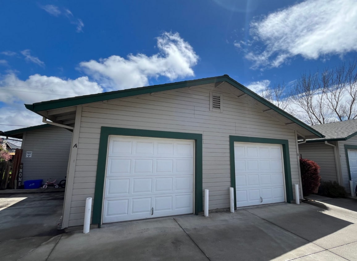 Primary Photo - Single Level 2 Bed/2 Bath End Unit with Ga...