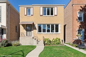 Building Photo - 5016 N Mango Ave