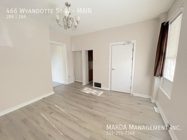 Building Photo - COZY 2 BEDROOM 1 BATH MAIN FLOOR UNIT+ 50% GAS