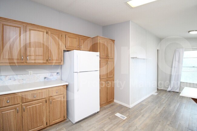 Building Photo - 9721 E Empress Ave
