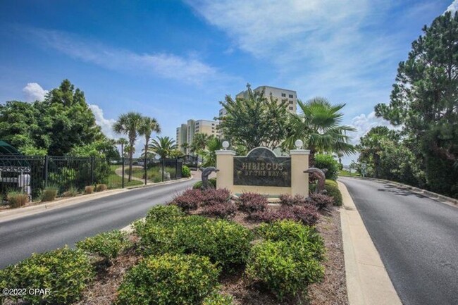 Building Photo - Beautiful waterfront condo in the gated co...