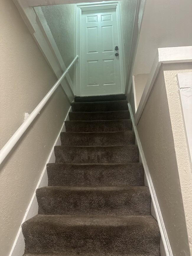 Stairs to unit #2 - 4653-2 Bryant Ave N