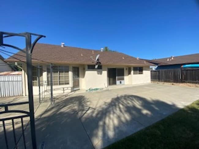 Building Photo - Huge semi-private Backyard with Large Patio!