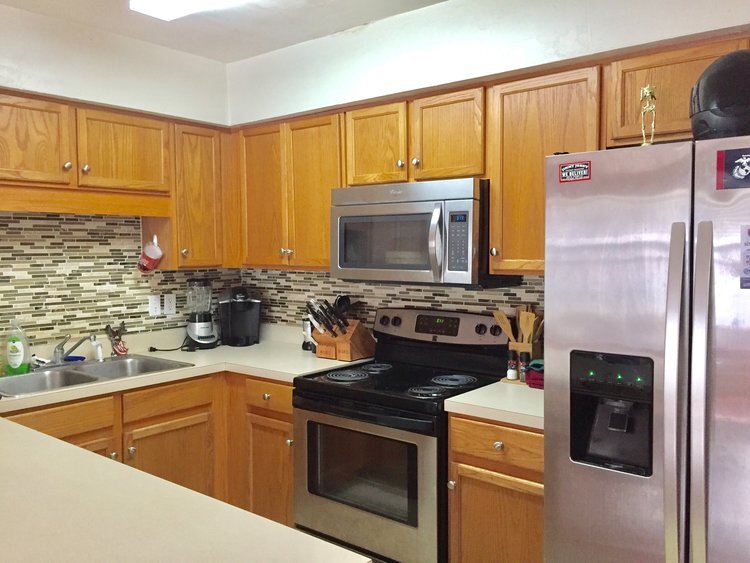 Stainless Steel Appliances/tile backsplash - 1409 Deer Haven Ln
