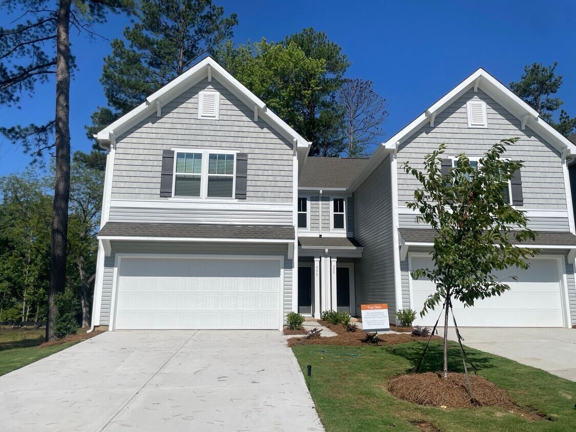 Primary Photo - 3 Bedroom paired home with 2 car garage mi...