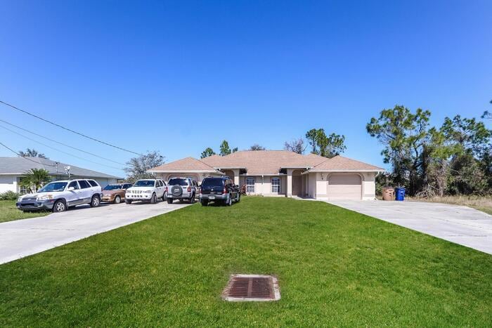 Primary Photo - Attractive 3/2/1 Duplex in Lehigh Acres!