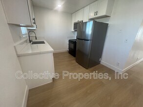 Building Photo - 3965 Logan Ave
