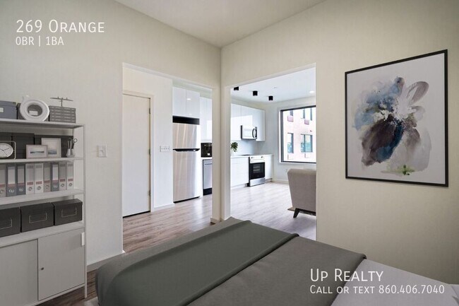 Building Photo - Chic Studio Apartment in Vibrant Downtown ...