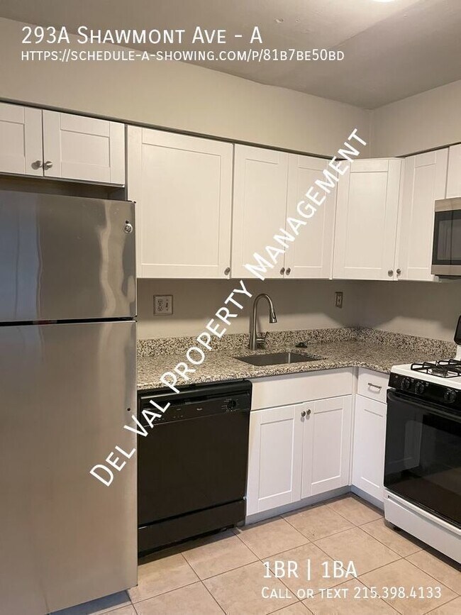Foto del edificio - Enchanting 1-Bedroom End-Unit Condo in Rox...