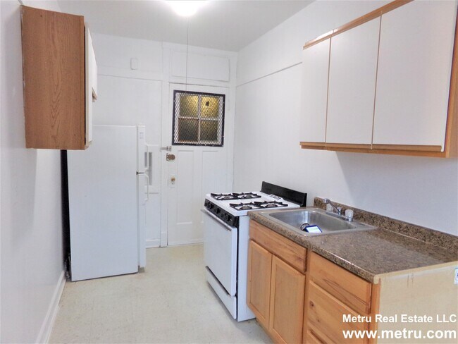 Foto del edificio - 6540 N Lakewood Ave