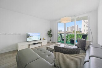 Building Photo - 19370 Collins Ave