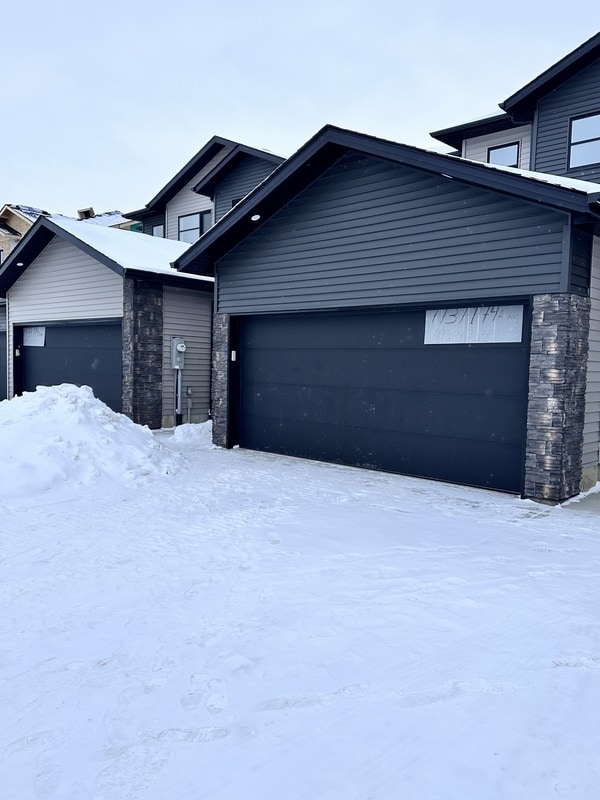 Building Photo - 7729-174A 174A Ave NW