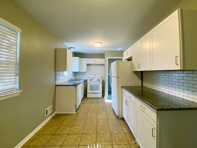 Building Photo - Corner Lot Charmer with 2-Car Garage in Ov...