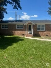 Building Photo - 300 Cedar Ln