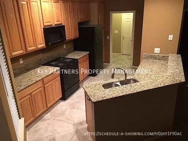 Building Photo - 9232 Boehm - Spacious Townhome!