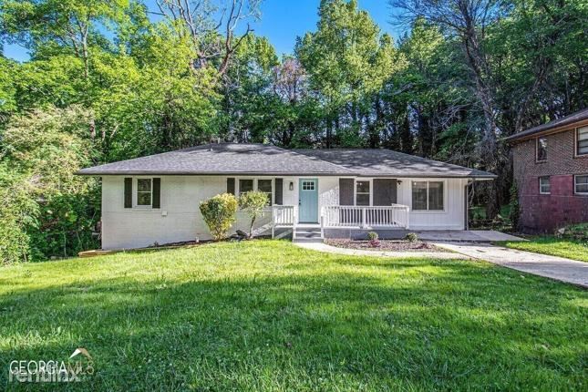 Foto principal - 4 br, 3 bath House - 1778 R Vicki Lane SE