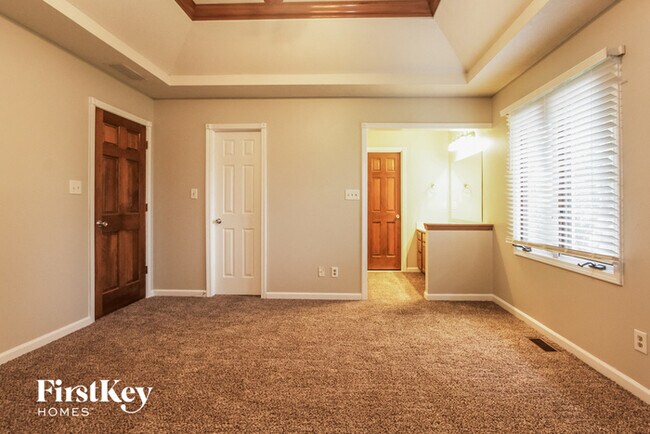 Building Photo - 8535 Spend a Buck Dr