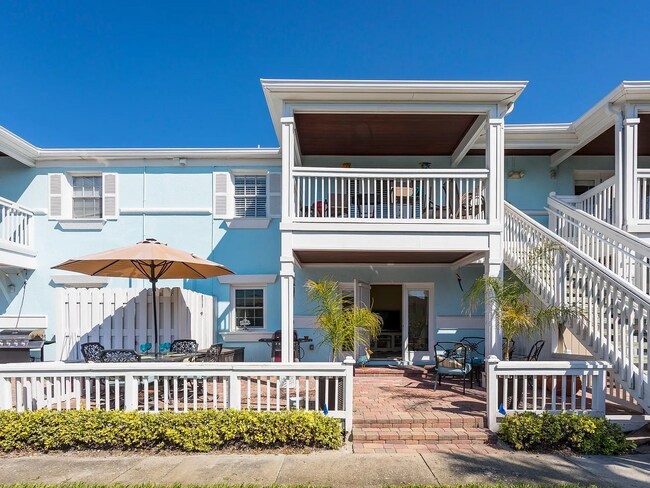 Building Photo - Stunning 2/1 available now at Waterside at Coqunia Key!
