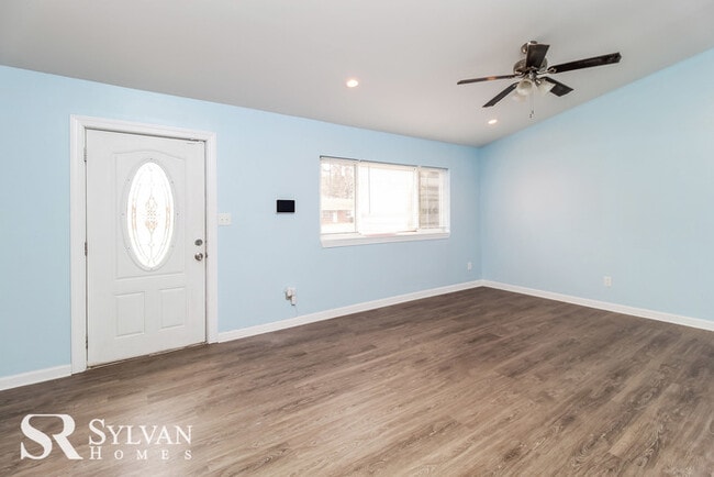 Building Photo - Enjoy easy living in this charming 4BR 2.5...