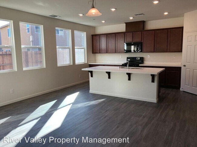 Building Photo - 4 br, 2.5 bath House - 5342 Pebble Banks Way
